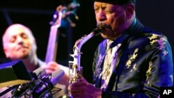 FILE - Jazz legend Ornette Coleman, front, performs with his quartet on the closing evening of the Skopje Jazz Festival, in Skopje, Macedonia. 