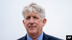 FILE - Virginia Attorney General Mark Herring attends a news conference near the White House, Feb. 26, 2018 in Washington.