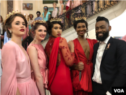 Haitian designer Prajje Oscar, right, with his models wearing gowns from his "Ezili" collection, which were hand-sewn by Haitian artisan women. Prajje's collection was the show stopper at the Haitian Embassy "Diplomacy By Design" event, Feb. 23, 2018. (VOA / S. Lemaire)