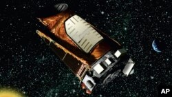 FILE - This artist's rendition provided by NASA shows the Kepler space telescope.