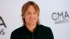 Keith Urban arrives at the 47th annual CMA Awards at Bridgestone Arena in Nashville, Tennessee, Nov. 6, 2013. 