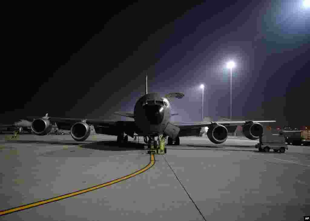 An Air Force KC-135 Stratotanker from the 340th Expeditionary Air Refueling Squadron, receives pre-flight checks before taking off in support of a mission to conduct airstrikes in Syria, Sept. 25, 2014.
