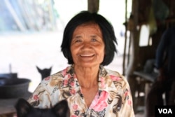 Seum Yun, 63, is the chief of Sovong village and has been tasked with registering residents for the CPP family book. "We don't know if they feel pressure or not, but we don't force them to sign," she said, Wednesday, November 8, 2017. (Sun Narin/VOA Khmer)
