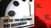 FILE - The Doomsday Clock, seen at the National Press Club in Washington, Jan. 23, 2020, reads 100 seconds to midnight. It remains unchanged for 2022.