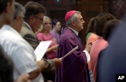 FILE - Bishop Ronald Gainer, of the Harrisburg Diocese, who's named in a grand jury report on rampant sexual abuse by Roman Catholic clergy is celebrating a Mass of forgiveness at the Cathedral Church of Saint Patrick in Harrisburg, Aug. 17, 2018.