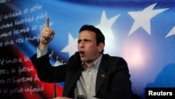 Henrique Capriles, Venezuela's opposition leader and governor of Miranda state, addresses the media in Caracas March 10, 2013.