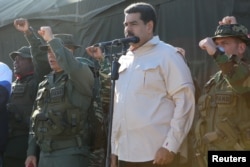 Venezuela's President Nicolas Maduro attends a military exercise in Charallave, Venezuela, Feb.10, 2019. (Miraflores Palace/Handout via Reuters)