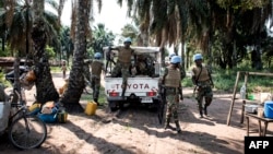 Les soldats ghanéens de la Mission de stabilisation de l'Organisation des Nations Unies en République Démocratique du Congo (MONUSCO) arriventdans un village du district de Kamonia, l'une des zones les plus touchées par les conflits dans la région du Kasa