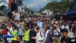 Supporters of Jammu Kashmir Liberation Front start marching toward the Line of Control, in Muzaffarabad, the capital of Pakistani Kashmir, Oct. 5, 2019. 