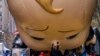 The Boss Baby balloon is deflated as it ends its appearance during the modified Macy&#39;s Thanksgiving Day Parade in New York.