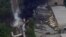 This image provided by WBAL-TV, shows a train derailment outside Baltimore on May, 28, 2013