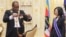Swaziland absolute Monarch King Mswati III bestows the Order of the Elephant to Taiwan President Tsai Ing-wen during her visit to the Kingdom of Swaziland, April 18, 2018, in Lozitha Palace, Manzini.