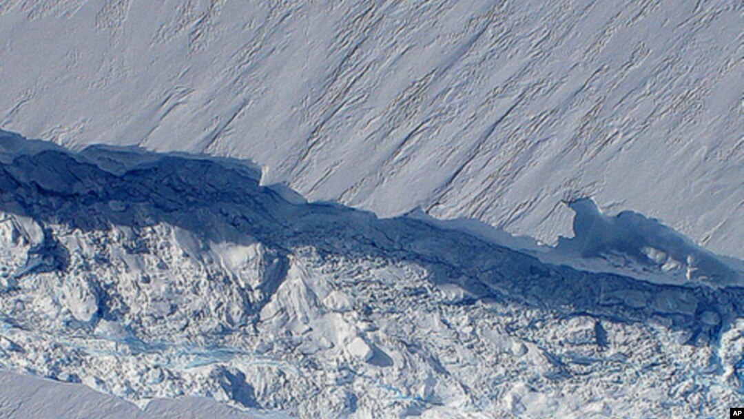 A massive crack running about 29 kilometers across Pine Island glacier’s floating tongue, taken during flight over region late October 2011.