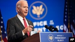 FILE - President-elect Joe Biden speaks at The Queen theater in Wilmington, Del., Nov. 19, 2020.