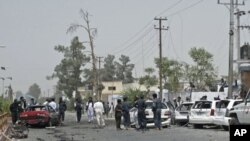 A view showing the scene of a bomb blast in Helmand province, August 27, 2011