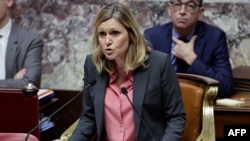 FILE - President of the French National Assembly Yael Braun-Pivet delivers a speech during the voting session at the National Assembly, the French Parliament's lower house, in Paris on Dec. 2, 2024.