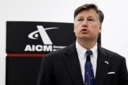 FILE - Christopher Landau, newly appointed U.S. Ambassador to Mexico, delivers a message after arriving at the Benito Juarez International Airport in Mexico City, Mexico, Aug. 16, 2019.