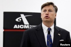 FILE - Christopher Landau, newly appointed U.S. Ambassador to Mexico, delivers a message after arriving at the Benito Juarez International Airport in Mexico City, Mexico, Aug. 16, 2019.