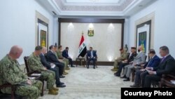 Iraq Prime Minister Ali Al-Zaidi meetsr Admiral Charles Brad Cooper the Commander of the United States Central Command (CENTCOM)