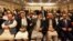 Afghan politicians, from second left to right, Mohammad Karim Khalili, Gulbuddin Hekmatyar, Haneef Atmar and Ustad Atta Mohammad Noor, and others attend the opening session of an Afghan Peace Conference, Bhurban, Pakistan, June 22, 2019.
