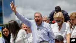 FILE - Opposition presidential candidate Edmundo Gonzalez leads a demonstration against the official election results that declared that President Nicolas Maduro won reelection in Caracas, Venezuela, July 30, 2024.