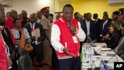 Presidential candidate Uhuru Kenyatta, address his supporters after receiving a clearance certificate from the election commission for the presidential race, at Kenyatta International Conference Centre in Nairobi, Kenya, May 29, 2017.