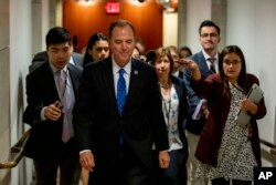 FILE - House Intelligence Committee Chairman Rep. Adam Schiff leaves a secure area where he was taking part in the House impeachment inquiry into President Donald Trump, on Capitol Hill, Oct. 23, 2019.