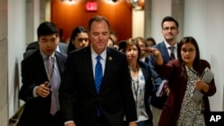 House Intelligence Committee Chairman Adam Schiff of California leaves after hearing testimony in the House impeachment inquiry into President Donald Trump, Oct. 23, 2019, on Capitol Hill in Washington.