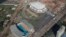 FILE - The Olympic Arena, top, and the Maria Lenk Aquatics Center under construction in Rio de Janeiro, Brazil, June 27, 2014. International sports federations expressed concern Tuesday over problems with venues for the summer Olympics.