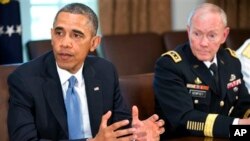 Kepala Staf Militer Gabungan Jenderal Martin Dempsey dalam sebuah pertemuan dengan Presiden Barack Obama dan pejabat lainnya untuk membahas kekerasan seksual dalam militer. (AP/Jacquelyn Martin)