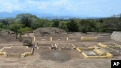 Investigators work at the Ndachjian–Tehuacan archaeological site in Tehuacan, Puebla state, Mexico, where archaeologist have identified the first known temple to the Flayed Lord, in this 2018 photo provided by Mexico's National Institute of Anthropology and History .