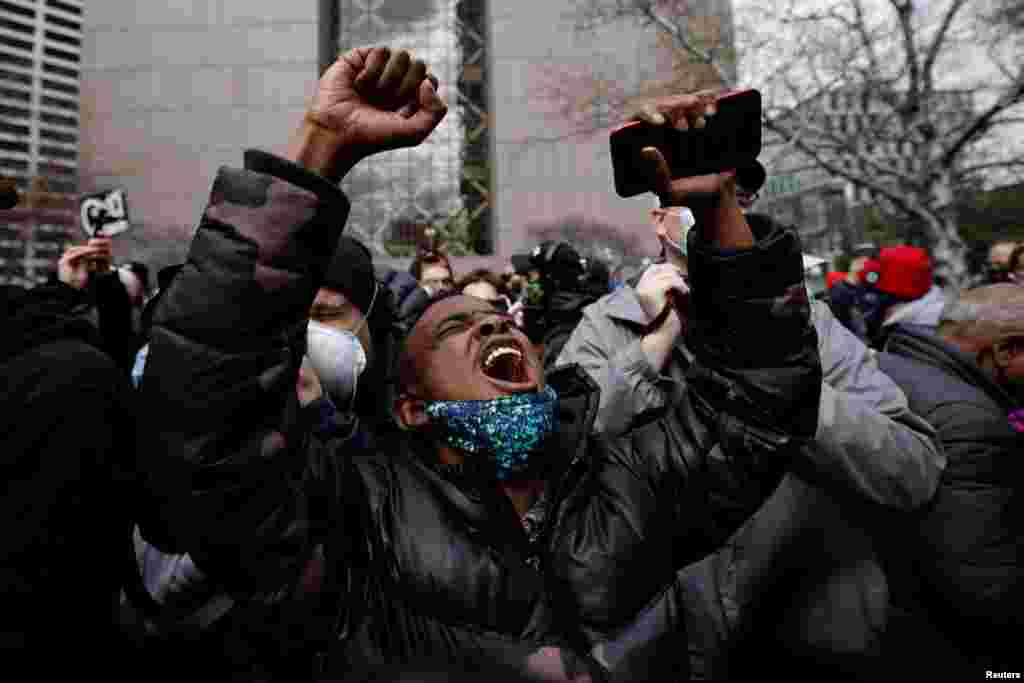 A person reacts after the verdict in the trial of former Minneapolis police officer Derek Chauvin, in the death of George Floyd, in front of Hennepin County Government Center, in Minneapolis.