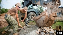 Navy Seabees construct a five-stall bathroom for Sromo Primary School in Svay Rieng province, Cambodia, Jan. 9, 2017. (Photos by Navy Petty Officer 1st Class Benjamin A. Lewis)