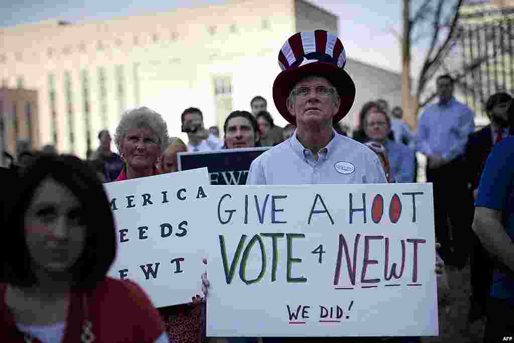 Supporters of Republican presidential candidate Newt Gingrich listen to him speak during a campaign rally in Nashville, Tennessee. (AP)