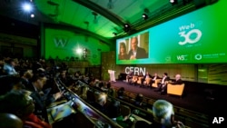 English computer scientist Tim Berners-Lee, 3rd left on the podium, best known as the inventor of the World Wide Web, attends an event at the CERN in Meyrin near Geneva, Switzerland, March 12, 2019 marking 30 years of World Wide Web.