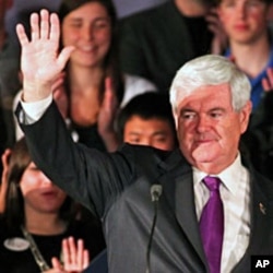 Republican U.S. presidential candidate and former Speaker of the House Newt Gingrich waves to supporters at the conclusion of his speech at his Alabama and Mississippi primary election night rally in Hoover, Alabama, March 13, 2012