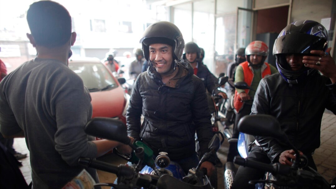 Nepalese wait in line at a gas station in Kathmandu, Nepal, Tuesday, Feb. 23, 2016.