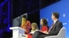 Ghanian journalist Anas Anas addresses the Global Conference for Media Freedom in London, July 10, 2019. Looking on are, from left, Canadian Minister for Foreign Affairs Chrystia Freeland, lawyer Amal Clooney, and U.K. Foreign Secretary Jeremy Hunt.