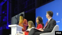 Ghanian journalist Anas Anas addresses the Global Conference for Media Freedom in London, July 10, 2019. Looking on are, from left, Canadian Minister for Foreign Affairs Chrystia Freeland, lawyer Amal Clooney, and U.K. Foreign Secretary Jeremy Hunt.