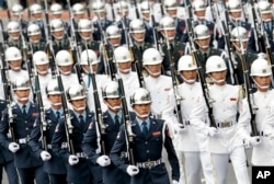 Taiwan military honor guard march during the National Day celebrations in Taipei, Taiwan, Oct. 10, 2016.