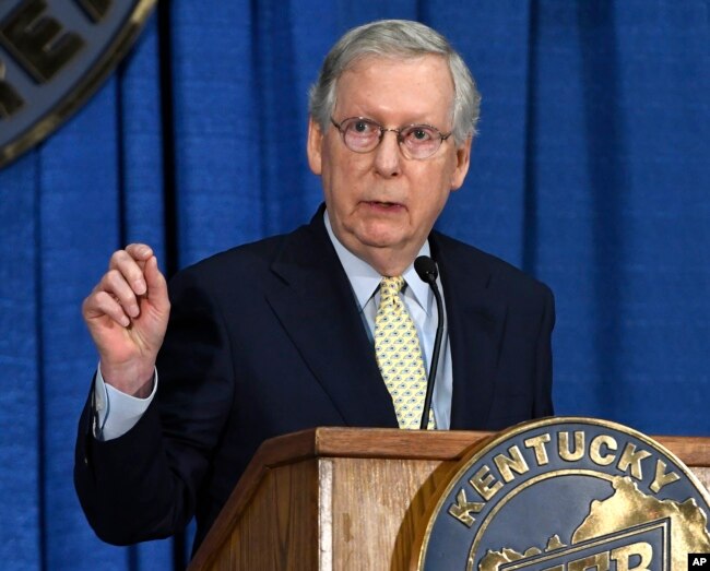 Senate Majority Leader Mitch McConnell of Ky. speaks during the Kentucky Farm Bureau Country Ham Breakfast, Aug. 24, 2017, in Louisville, Ky.