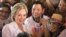 FILE - Democratic U.S. presidential candidate Hillary Clinton poses with supporters after a "Latinos for Hillary" rally in San Antonio, Texas, Oct. 15, 2015. 