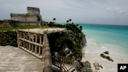 FILE - A view of ancient ruins along the Caribbean Sea in Tulum, Mexico, Aug. 20, 2007. 