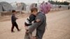 Cash Aid for Refugees Succeeds Despite Donors' Doubts