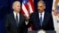 Vice President Joe Biden (left) with Attorney General Eric Holder April 9, 2013