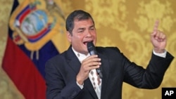 Ecuador's leftist President Rafael Correa addresses the nation at Carondelet Palace in Quito, Ecuador, February 27, 2012.