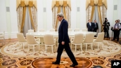 FILE - Secretary of State John Kerry arrives to meet with Russian President Vladimir Putin at the Kremlin in Moscow, Russia, March 24, 2016.