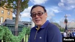 FILE - Chinese-Australian writer Yang Hengjun is seen at an unidentified location in this still image from an undated video obtained via social media. (Twitter @yanghengjun)