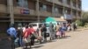 People queue for COVID-19 vaccine shots at Zimbabwe's largest health institution, Parirenyatwa Hospital, in Harare, June 08, 2021. (Columbus Mavhunga/VOA)