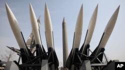 Models of a mock North Korea Scud-B missile, center, and other South Korean missiles are displayed at Korea War Memorial Museum in Seoul, South Korea, March 17, 2013. 